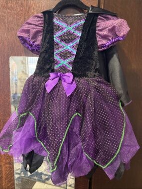 Girls Purple Witch Costume Dress with Green Trim and purple black tights
